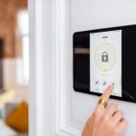 Controlling home alarm system with a touch screen